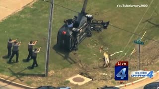 SUV Crashes Through Utility Police During Police Pursuit