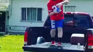 Bills Mafia baby gender reveal involves jumping through a table