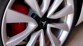 How to Remove a Tesla Model 3 Wheel Cap