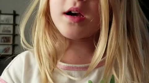 Adorable toddler talks about money