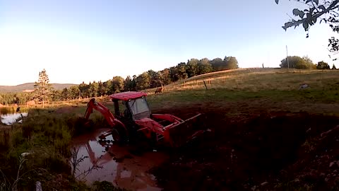 Backhoe flipped into a pond. Here's how I got it upright