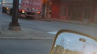 Semi Truck Knocks and Drags Pole Down Street