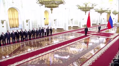 Putin welcomes Xi to Kremlin for formal talks