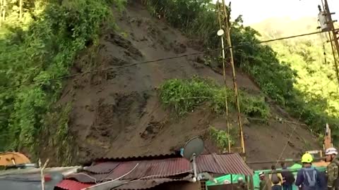 Dozens killed after landslide buries bus in Columbia