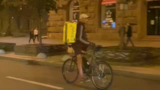 Food Delivery Guy Rides Backward