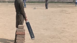 Playing cricket