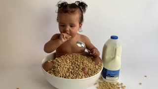 Adorable Baby Sits in Giant Bowl of Cereal