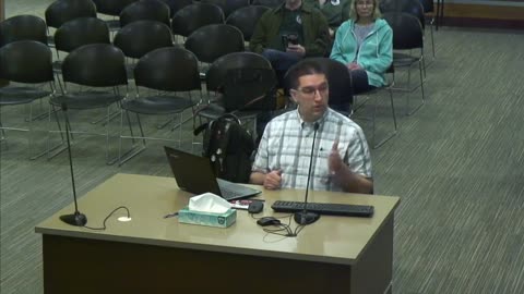 Rick Weible hacks a laptop live during Commission meeting!