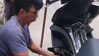 Removing a Snake from a Moped