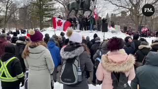 Protestors against COVID restrictions sing O Canada in Toronto