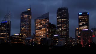 Time Lapse Video of Buildings in a City at Sunset.