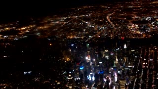 Aviation Flying Over Manhatten At Night