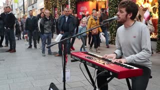 Street performer in Dublin wows crowd with Beatles cover