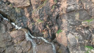 Person Falls From Cliff Face