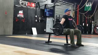 Seated muscle snatch