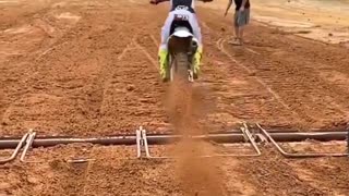 Flying dirt directly into the camera from a motorcycle