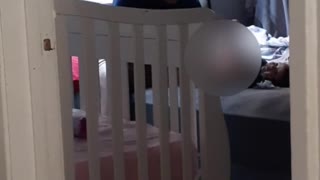 Dad Struggles to Change Baby's Diaper
