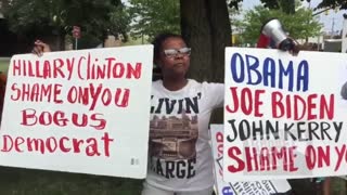 Immigrants From Haiti Protest the Clinton's Crimes Against Humanity