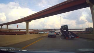 Top Heavy Trailer Causes Truck and Trailer to Tip