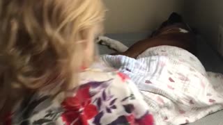 Sweet Toddler Tucks In Doggy Best Friend For A Nap