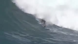 watch this amazing surfing with a giant wave