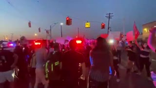 Detroit police SUV drives through crowd of protesters