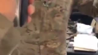 Army investigating video showing soldier aiming loaded pistol