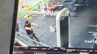 Guy at gym gets sent flying by the cable machine