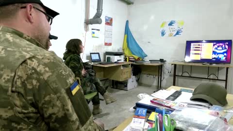 Ukrainian service members cheer for Eurovision win