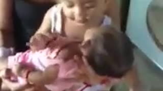 Cute Year Old Protecting & Singing for the Baby