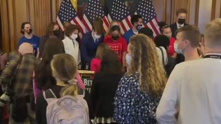 Nancy Pelosi hugging people and shaking hands without a mask on
