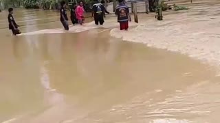 Retrieving a Motorcycle from Flooded Road