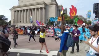 The Youth Climate March makes their way towards the Capitol Building on the 5th day of protests in the city
