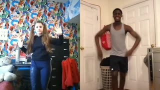 Girl having a dance off with someone on tiktok