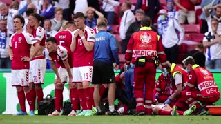 Denmark soccer player 'awake' after collapsing