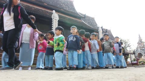 Children visiting Buddhist temple