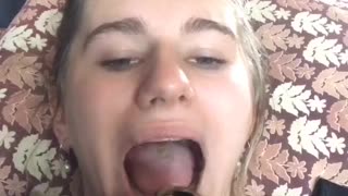 Chicken Climbs Straight Into Woman's Mouth