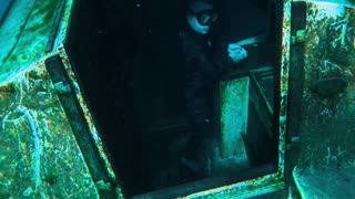Washing Hands Inside a Sunken Boat
