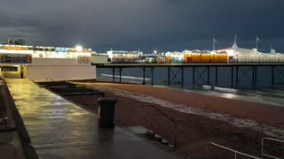 Evening at Paignton pier with a cruise ship docked