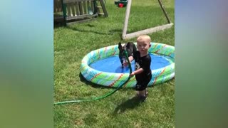 Funny Baby Playing Water
