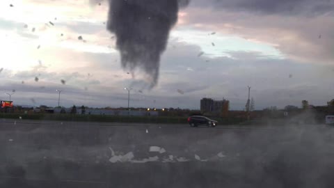 short tornado on the parking