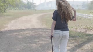Woman Walking with Dog
