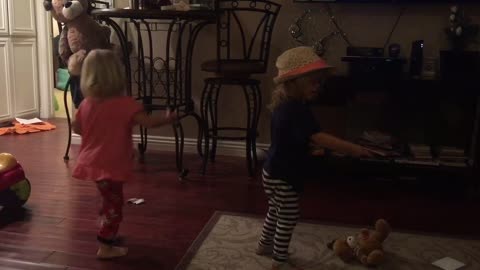 Two Year old twins a have a dance party