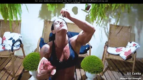 Gil Cunha destroys watermelons using her muscular arms