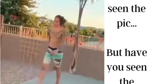 Brittney Griner shirtless shooting hoops around a pool