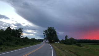 Cyclist Stops for Epic Sunset as Storm Approaches