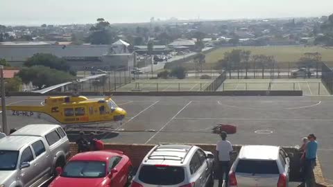 Helicopter fills up at school