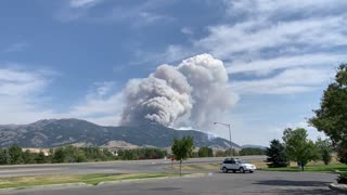Plane Drops Fire Retardant to Control Montana Wildfire