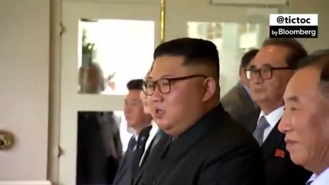 Trump jokes with kim Jong un at summit