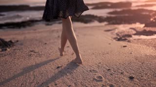 Walking barefoot on golden sand